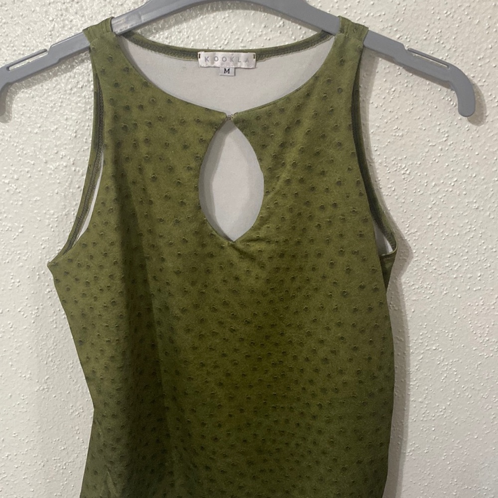Kookla shirt
Color: Green
Size: Medium